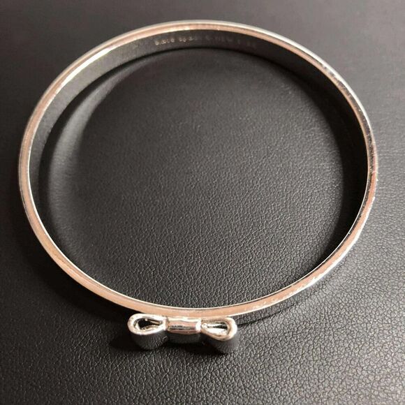 1948 Kate Spade New York BOW silver tone 6mm minimalist bangle bracelet 7.75" - Picture 2 of 3